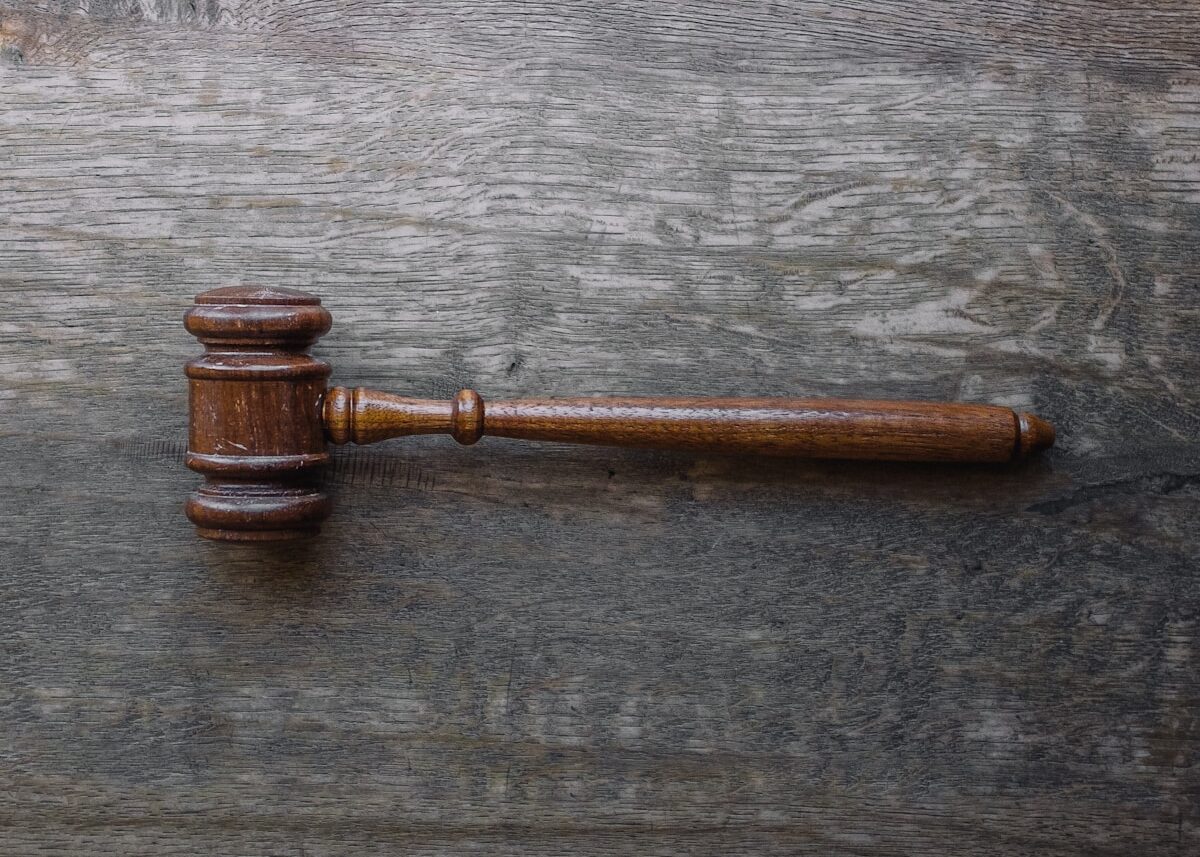 brown mallet on gray wooden surface